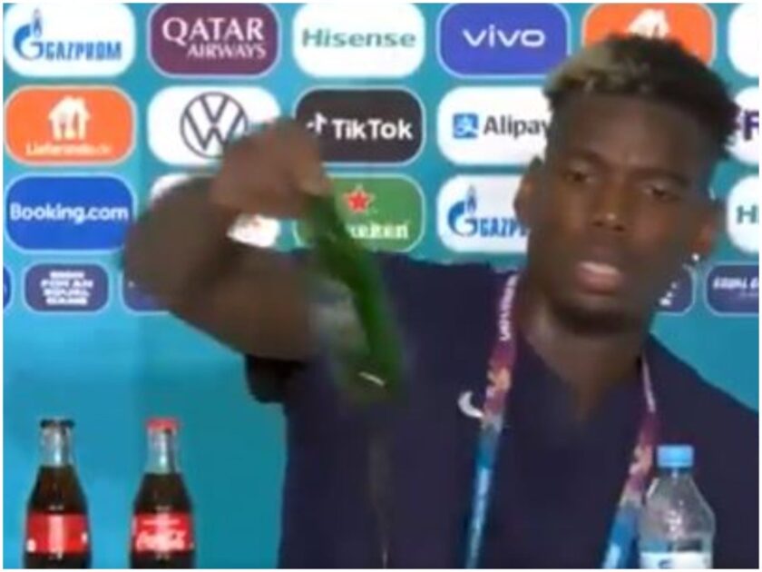 Paul Pogba, French Muslim footballer, removes beer bottle during Euro 2020 press conference.